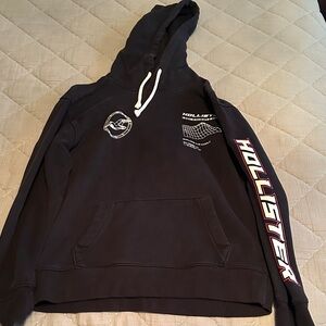 Hollister Men's Black Hoodie with White and Red Accents